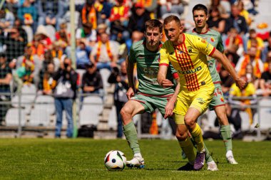 Taras Romanczuk ve Wiktor Dlugosz, Korona Kielce ve Jagiellonia Bialystok (Maciej Rogowski) takımları arasında oynanan PKO BP Ekstraklasa maçında görüldü.)