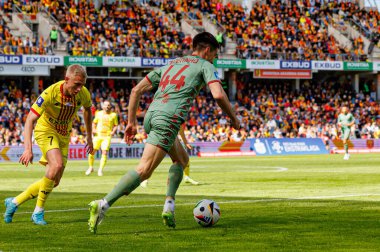 Dawid Blanik ve Joao Moutinho, Korona Kielce ve Jagiellonia Bialystok (Maciej Rogowski) takımları arasındaki PKO BP Ekstraklasa maçında görüldü.)