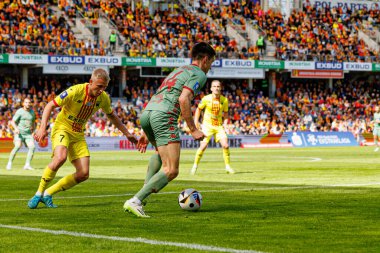 Dawid Blanik ve Joao Moutinho, Korona Kielce ve Jagiellonia Bialystok (Maciej Rogowski) takımları arasındaki PKO BP Ekstraklasa maçında görüldü.)