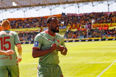 Afimico Pululu, Korona Kielce ve Jagiellonia Bialystok (Maciej Rogowski) takımları arasındaki PKO BP Ekstraklasa maçında gol attıktan sonra kutlama yaparken görüldü.)