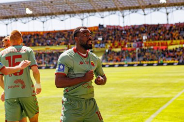 Afimico Pululu, Korona Kielce ve Jagiellonia Bialystok (Maciej Rogowski) takımları arasındaki PKO BP Ekstraklasa maçında gol attıktan sonra kutlama yaparken görüldü.)