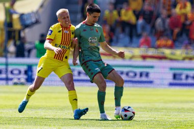 Dawid Blanik ve Joao Moutinho, Korona Kielce ve Jagiellonia Bialystok (Maciej Rogowski) takımları arasındaki PKO BP Ekstraklasa maçında görüldü.)