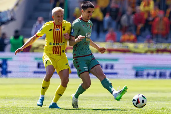 Dawid Blanik ve Joao Moutinho, Korona Kielce ve Jagiellonia Bialystok (Maciej Rogowski) takımları arasındaki PKO BP Ekstraklasa maçında görüldü.)