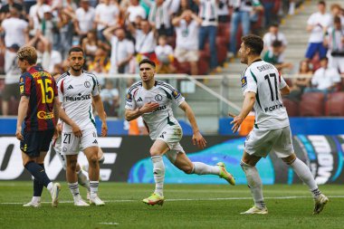 Rubne Vinagre, Legia Warszawa ve Pogon Szczecin (Maciej Rogowski) takımları arasında oynanan 2025 Polonya Kupası finalinde gol attıktan sonra kutlama yaparken görüldü.)