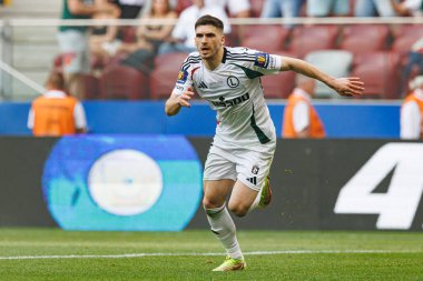Rubne Vinagre, Legia Warszawa ve Pogon Szczecin (Maciej Rogowski) takımları arasında oynanan 2025 Polonya Kupası finalinde gol attıktan sonra kutlama yaparken görüldü.)