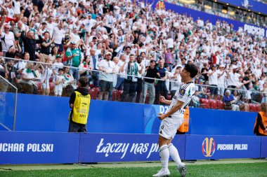 Ryoya Morishita, Legia Warszawa ve Pogon Szczecin (Maciej Rogowski) takımları arasında oynanan 2025 Polonya Kupası finalinde gol attıktan sonra kutlama yaparken görüldü.)