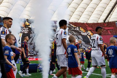 Ruben Vinagre, Maximillian Oyedele ve Juergen Elitim 2025 Polonya Kupası finalinde Legia Warszawa ve Pogon Szczecin (Maciej Rogowski) takımları arasında görüldü.)