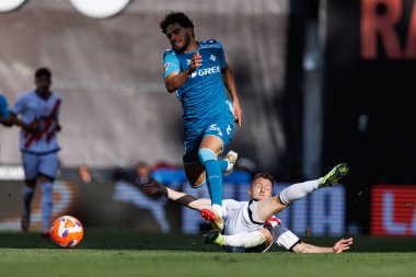 Abdessamad Ezzalzouli ve Ivan Balliu, Estadio de Vallecas 'taki Rayo Vallecano ve Real Betis Balompie (Maciej Rogowski) takımları arasında oynanan LaLiga EA Spor karşılaşmasında görüldü.