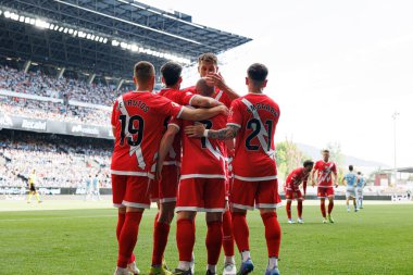 RC Celta de Vigo ve Rayo Vallecano (Maciej Rogowski) takımları arasında oynanan LaLiga EA Spor karşılaşmasında Rayo 'nun oyuncuları Isi Palazon' dan gol üstüne gol atarken görüldü.)