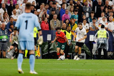 Almanya ve Portekiz milli takımları arasında oynanan 2025 UEFA Milletler Ligi yarı final maçında Vitinha ve Florian Wirtz görüldü (Maciej Rogowski)