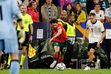 Almanya ve Portekiz milli takımları arasında oynanan 2025 UEFA Milletler Ligi yarı final maçında Vitinha ve Florian Wirtz görüldü (Maciej Rogowski)