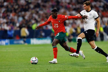 Nuno Mendes ve Leon Goretzka, Almanya ve Portekiz milli takımları arasında oynanan 2025 UEFA Milletler Ligi yarı final maçında görüldü (Maciej Rogowski)