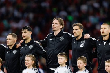 Aleksandar Pavloviç, Nick Woltemade ve Leon Goretzka, UEFA Uluslar Ligi 2025 yarı final maçında Almanya ve Portekiz milli takımları arasında görüldü (Maciej Rogowski)