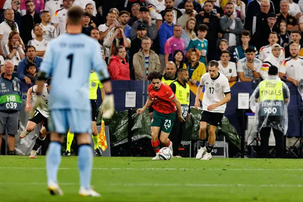 Almanya ve Portekiz milli takımları arasında oynanan 2025 UEFA Milletler Ligi yarı final maçında Vitinha ve Florian Wirtz görüldü (Maciej Rogowski)