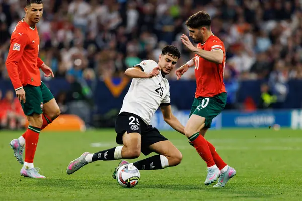 Aleksandar Pavloviç ve Pedro Neto, Almanya ve Portekiz milli takımları arasında oynanan 2025 UEFA Milletler Ligi yarı final maçında izlediler (Maciej Rogowski)