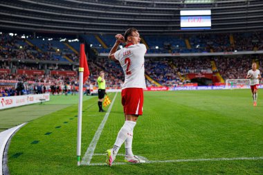 Matty Cash, Polonya ve Moldova milli takımları arasında oynanan uluslararası dostluk maçında attığı golün ardından kutlama yaparken görülüyor (Maciej Rogowski))