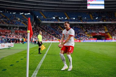 Matty Cash, Polonya ve Moldova milli takımları arasında oynanan uluslararası dostluk maçında attığı golün ardından kutlama yaparken görülüyor (Maciej Rogowski))