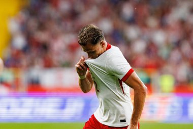 Matty Cash, Polonya ve Moldova milli takımları arasında oynanan uluslararası dostluk maçında attığı golün ardından kutlama yaparken görülüyor (Maciej Rogowski))