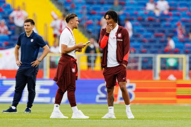 Polonya ve Moldova milli takımları arasında oynanan uluslararası dostluk maçı sırasında Matty Cash ve Maximilian Oyedele (Maciej Rogowski)