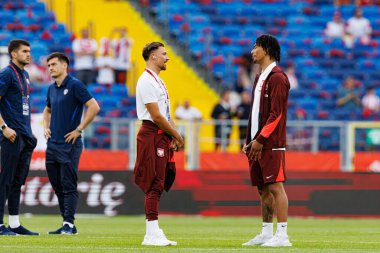 Polonya ve Moldova milli takımları arasında oynanan uluslararası dostluk maçı sırasında Matty Cash ve Maximilian Oyedele (Maciej Rogowski)