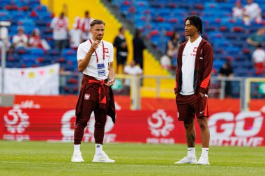 Polonya ve Moldova milli takımları arasında oynanan uluslararası dostluk maçı sırasında Matty Cash ve Maximilian Oyedele (Maciej Rogowski)