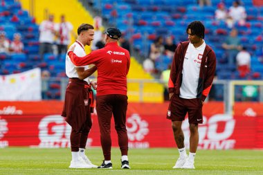 Polonya ve Moldova milli takımları arasında oynanan uluslararası dostluk karşılaşmasında Matty Cash, Michal Probierz ve Maximilian Oyedele görüldü (Maciej Rogowski)