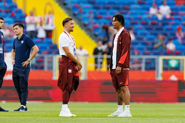 Polonya ve Moldova milli takımları arasında oynanan uluslararası dostluk maçı sırasında Matty Cash ve Maximilian Oyedele (Maciej Rogowski)