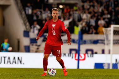 Mateusz Skrzypczak, Finlandiya ve Polonya milli takımları arasında oynanan 2026 Dünya Kupası Avrupa ön eleme maçında görüldü (Maciej Rogowski)