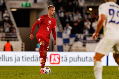 Mateusz Skrzypczak, Finlandiya ve Polonya milli takımları arasında oynanan 2026 Dünya Kupası Avrupa ön eleme maçında görüldü (Maciej Rogowski)