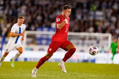 Matty Cash, Finlandiya ve Polonya milli takımları arasında oynanan 2026 Dünya Kupası ön eleme maçında görüldü (Maciej Rogowski))