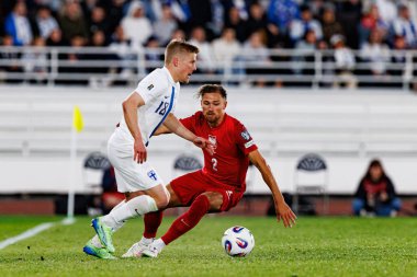 Jere Uronen ve Matty Cash, Finlandiya ve Polonya milli takımları arasındaki Dünya Kupası 2026 Avrupa ön eleme maçında görüldü (Maciej Rogowski)