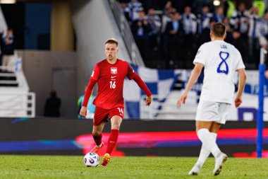 Mateusz Skrzypczak, Finlandiya ve Polonya milli takımları arasında oynanan 2026 Dünya Kupası Avrupa ön eleme maçında görüldü (Maciej Rogowski)