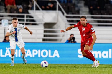Matty Cash, Finlandiya ve Polonya milli takımları arasında oynanan 2026 Dünya Kupası ön eleme maçında görüldü (Maciej Rogowski))