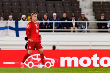 Mateusz Skrzypczak, Finlandiya ve Polonya milli takımları arasında oynanan 2026 Dünya Kupası Avrupa ön eleme maçında görüldü (Maciej Rogowski)