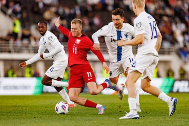 Karol Swiderski ve Kaan Kairinen, 2026 Dünya Kupası 'nda Finlandiya ve Polonya milli takımları arasında oynanan Avrupa ön eleme maçında görüldü (Maciej Rogowski)