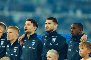 Kaan Kairinen, Arttu Hoskonen ve Glen Kamara, Finlandiya ve Polonya milli takımları arasında oynanan 2026 Dünya Kupası Avrupa ön eleme maçında görüldü (Maciej Rogowski)