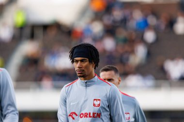 Dünya Kupası 2026 Avrupa ön eleme maçında Finlandiya ve Polonya milli takımları arasında Maximilian Oyedele görüldü (Maciej Rogowski)