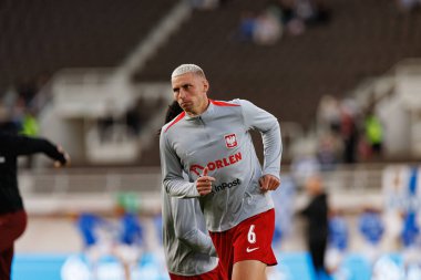 Jakub Piotrowski, Finlandiya ve Polonya milli takımları arasında oynanan 2026 Dünya Kupası ön eleme maçında görüldü (Maciej Rogowski)