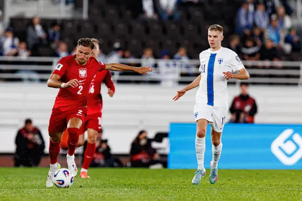 Matty Cash, Finlandiya ve Polonya milli takımları arasında oynanan 2026 Dünya Kupası ön eleme maçında görüldü (Maciej Rogowski))