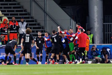 Gürcistan 'ın oyuncuları, Polonya ve Gürcistan milli takımları arasında oynanan UEFA U-21 2025 maçında gol üstüne gol atarken görüldü (Maciej Rogowski)