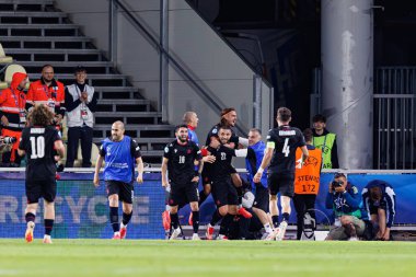 Gürcistan 'ın oyuncuları, Polonya ve Gürcistan milli takımları arasında oynanan UEFA U-21 2025 maçında gol üstüne gol atarken görüldü (Maciej Rogowski)
