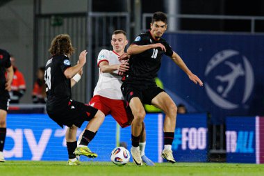 Polonya ve Gürcistan milli takımları arasında oynanan UEFA Euro U-21 2025 maçında Kacper Kozlowski ve Giorgi Maisuradze görüldü (Maciej Rogowski)