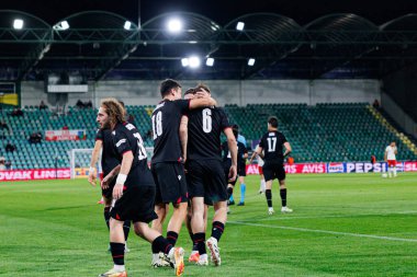 Nodar Lominadze, Polonya ve Gürcistan milli takımları arasında oynanan UEFA Euro U-21 2025 maçında gol attıktan sonra kutlama yaparken görüldü (Maciej Rogowski)