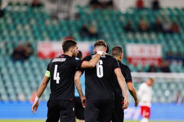 Nodar Lominadze, Polonya ve Gürcistan milli takımları arasında oynanan UEFA Euro U-21 2025 maçında gol attıktan sonra kutlama yaparken görüldü (Maciej Rogowski)