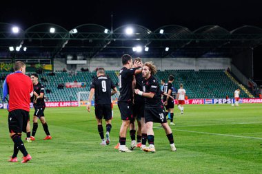 Nodar Lominadze, Polonya ve Gürcistan milli takımları arasında oynanan UEFA Euro U-21 2025 maçında gol attıktan sonra kutlama yaparken görüldü (Maciej Rogowski)