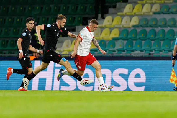 Nodar Lominadze ve Kacper Kozlowski, Polonya ve Gürcistan milli takımları arasında oynanan UEFA Euro U-21 2025 maçında görüldü (Maciej Rogowski)