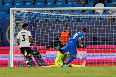 Tio Cipot ve Noah Atubolu, Almanya ve Slovenya milli takımları arasında oynanan UEFA U-21 2025 maçında görüldü (Maciej Rogowski)