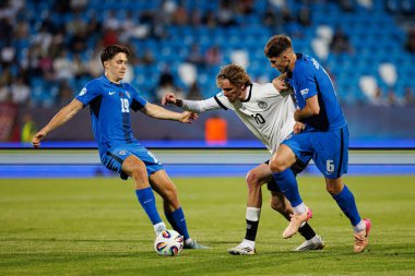 Almanya ve Slovenya milli takımları arasında oynanan UEFA Euro U-21 2025 maçında Enrick Ostrc, Nick Woltemade ve Zan Jevsenak görüldü (Maciej Rogowski)