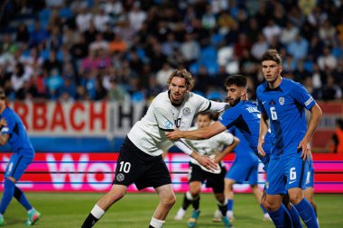 Nick Woltemade ve Adrian Zeljkoviç, Almanya ve Slovenya milli takımları arasında oynanan UEFA U-21 2025 maçında görüldü (Maciej Rogowski)