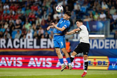 Almanya ve Slovenya milli takımları arasında oynanan UEFA U-21 2025 maçında Srdan Kuzmiç ve Paul Nebel görüldü (Maciej Rogowski)